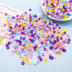 Close-up of colorful 6mm silicone spacer beads for DIY jewelry making in mixed pastel tones
