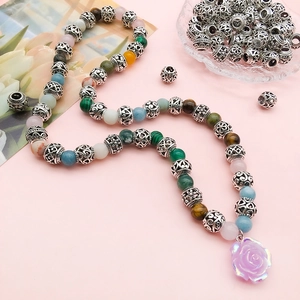 Hollow round alloy beads and colorful gemstone necklace with purple rose flower pendant