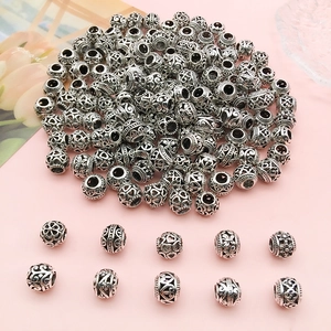 Hollow Tibetan silver alloy flower beads for DIY jewelry with vintage heart patterns