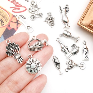Set of vintage silver wine-themed charms including grape and cocktail glass for DIY jewelry
