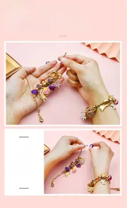 Macro shot of DIY Christmas charm bracelet with gold-plated chains and purple enamel beads