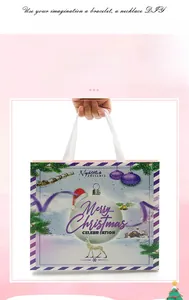 Festive Christmas gift bag featuring purple stripes, reindeer motifs, and white handles