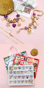 Macro detail of Christmas advent calendar with DIY purple beads and holiday charms