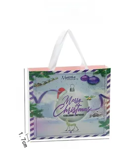 Purple Christmas gift bag with elk and sled design measuring 25x20.6x1.7cm for advent gift