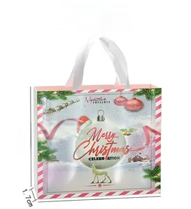 Bolsa de regalo rosa de Navidad con diseño de ciervo y asas blancas, 25x20,6cm