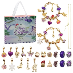 Purple themed Christmas Advent calendar jewelry kit with gold bracelets and DIY charms
