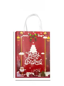 Red Christmas gift bag with festive Santa prints and white handles measuring 26x19x1.8cm