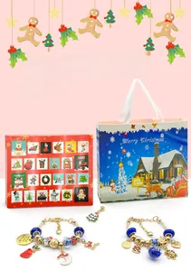 Close-up of a 24-day advent calendar box with Christmas DIY charm bracelet and charms