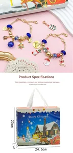 Detail of Christmas advent calendar jewelry set with golden snake chains and charms