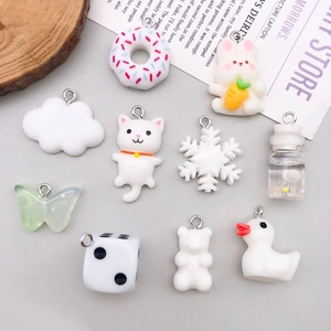 Assorted white resin cartoon charms with metal rings for DIY jewelry and keychains
