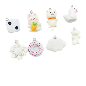 Mix of white resin charms featuring cute animals and shapes for DIY jewelry making