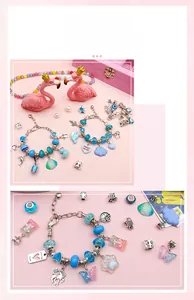 Detail view of children DIY jewelry set featuring blue beads and unicorn charms