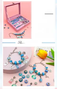 Detailed blue marine themed DIY jewelry set with dolphin charms and pink velvet gift box