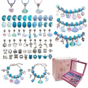 DIY jewelry making kit for girls featuring blue beads charms and pink storage case with gift bag
