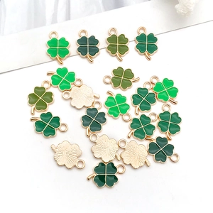 Colorful lucky four leaf clover pendants in mixed green tones for DIY jewelry making