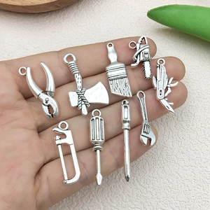 Antique silver alloy DIY tool charms set featuring pliers and saw for jewelry making