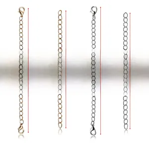 Detail showing 10cm and 12.7cm metal extender chains in gold and silver with lobster clasps