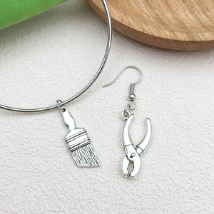 Creative antique silver DIY tool charms set featuring paintbrush and pliers pendants