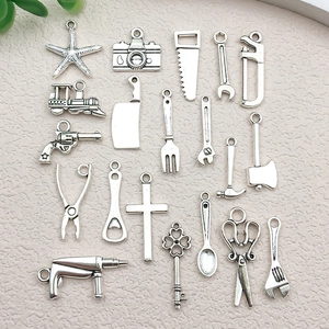 Set of 20 vintage silver alloy charms featuring assorted tools and symbols for DIY jewelry