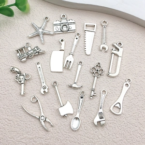 Detailed collection of antique silver alloy DIY pendants in various mini tool shapes