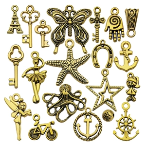 Set van 18 vintage gouden bedeltjes met vlinder en ster voor DIY-sieraden maken projecten
