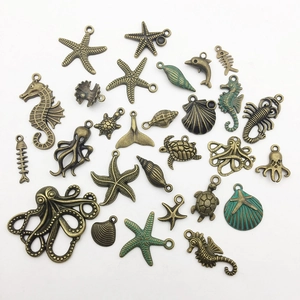 Detailed collection of vintage bronze sea creature charms for DIY jewelry making