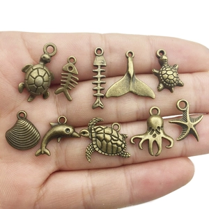 Retro bronze alloy sea animal charms including turtle and starfish pendants for DIY jewelry