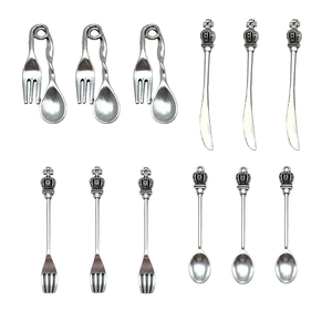 12-piece retro silver alloy charm set featuring crown knives, forks, and spoons