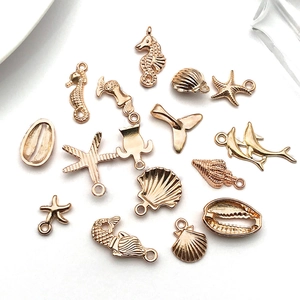 Detailed view of rose gold ocean-themed alloy charms for DIY jewelry making