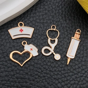 Medical charms set with stethoscope and syringe enamel pendants on black leather