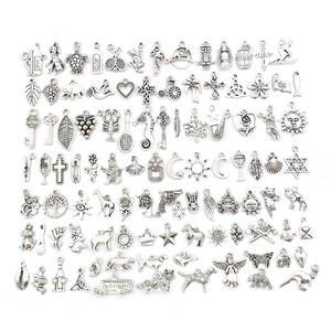 Bulk set of 84 vintage silver alloy charms featuring animals, plants, and creative DIY shapes