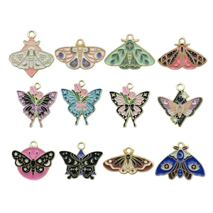 Detail view of 12 colorful enamel butterfly and moth charms with gold plating for jewelry making