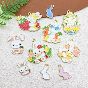 Detailed macro view of colorful enamel rabbit pendants for DIY jewelry crafting