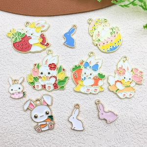 Detail of colorful enamel Easter bunny and flower charms for DIY jewelry making
