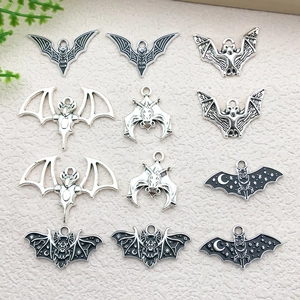 Set of 12 Halloween bat jewelry charms in silver finish for DIY necklaces and earrings