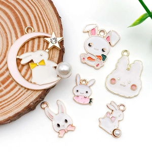 Detailed set of Easter bunny enamel pendants with pearls, stars, and moon for DIY jewelry