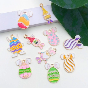 Detail of colorful Easter bunny and gnome alloy charms for DIY jewelry making