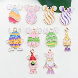 Flat lay of colorful Easter bunny egg and gnome alloy charms with polka dots and patterns