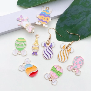 Detail showing colorful Easter gnome and bunny egg alloy charms with drip oil finish
