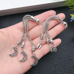 Tibetan silver tassel pendants with floral crescent and leaf charms for DIY jewelry making