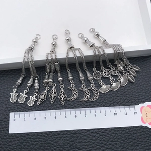 Tibetan silver tassel pendants with vintage charms like tulip and leaf for DIY jewelry