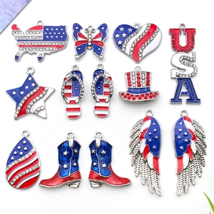 Detailed view of red, white and blue patriotic US charms with rhinestones for DIY crafts