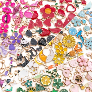 Mix of 270 colorful enamel alloy charms with floral and animal shapes for DIY jewelry