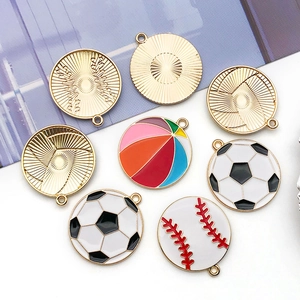 Detail of colorful enamel sports ball pendants including soccer, baseball and basketball