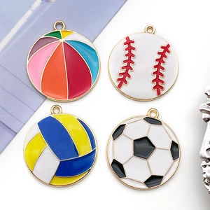 Set of four alloy sports ball pendants including baseball, soccer, volleyball and beach ball