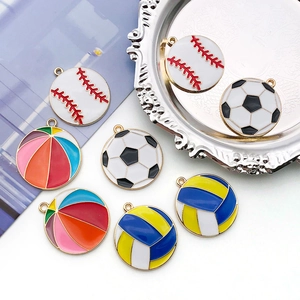 Macro shot of colorful sports ball enamel alloy pendants for DIY jewelry crafting