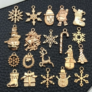 Collection de breloques de Noël dorées avec flocons et Père Noël pour bijoux DIY