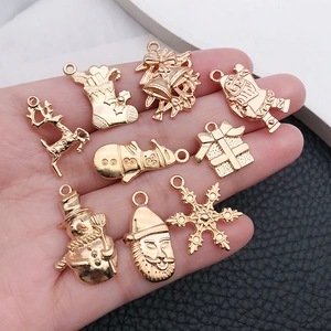 Lot de 9 pendentifs de Noël dorés en alliage avec Père Noël et élan pour bijoux DIY