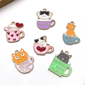 Detailed view of six cartoon cat in coffee cup enamel charms for DIY jewelry making