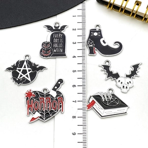 Gothic Halloween charms set with tombstone, bat, and skull icons for DIY jewelry
